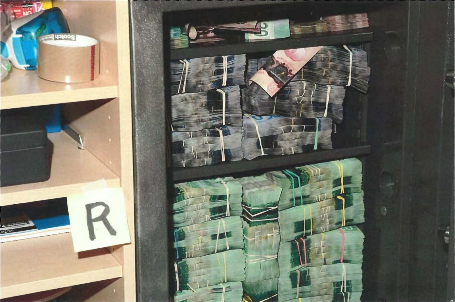 Bundled Canadian currency inside a safe, shown in Cullen Commission Exhibit 663
